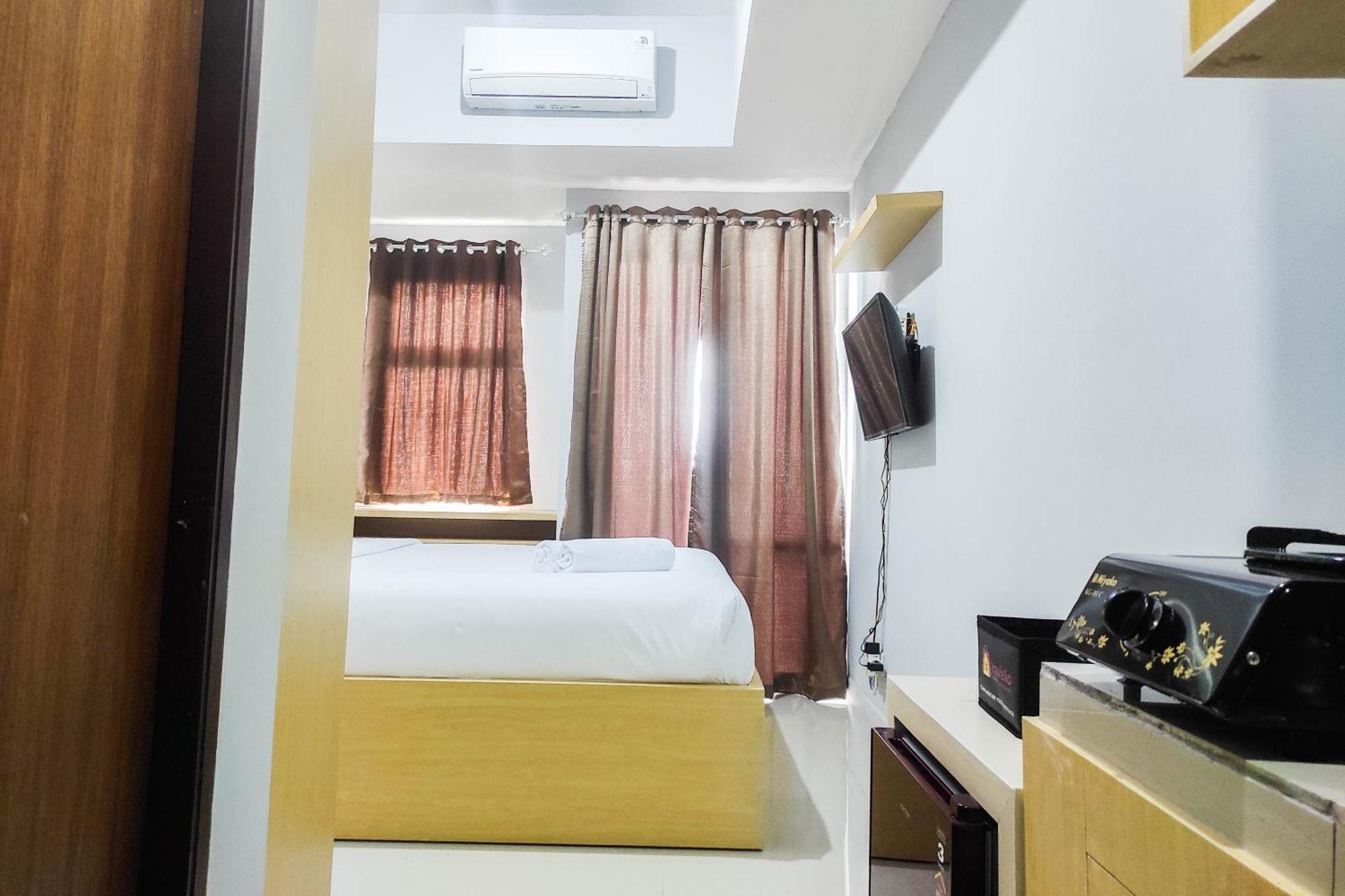 Comfy And Minimalist Studio At Vida View Apartment By Travelio Pampang Eksteriør bilde